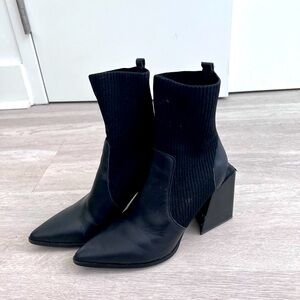 Steve Madden black heeled sock booties